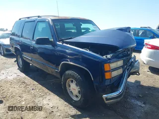 1999 GMC Yukon with VIN 1GKEK13R2XJ708582, listed as a IAAI auction lot 41698586 with 252,630 mi miles. Bid and sale history available at carsss.com. Image 1.