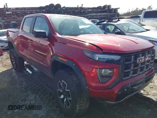 2024 GMC Canyon 4WD AT4X with VIN 1GTP6EEK1R1247720, listed as a IAAI auction lot 41571103 with 10,618 mi miles. Bid and sale history available at carsss.com. Image 1.