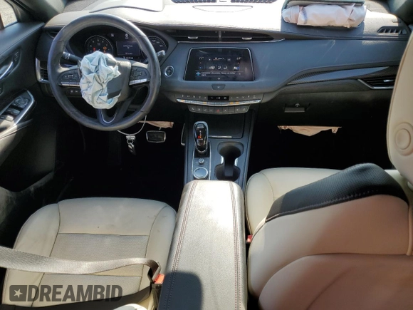 2021 Cadillac XT4 AWD Sport with VIN 1GYFZFR43MF032608, listed as a Copart auction lot 74906524 with 55,751 mi miles and Salvage title. Bid and sale history available at DreamBid. Image 8.