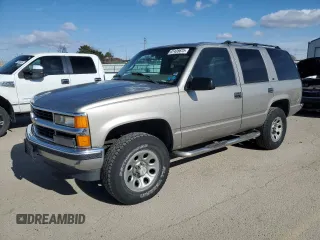 1999 Chevrolet Tahoe Z71 with VIN 1GNEK13R4XJ458295, listed as a Copart auction lot 47435675 with 211,422 mi miles and Salvage Title. Bid and sale history available at DreamBid. Image 1.