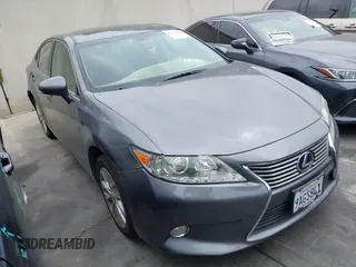 2015 Lexus ES 300h with VIN JTHBW1GG0F2083313, listed as a IAAI auction lot 42272875 with 142,318 mi miles and . Bid and sale history available at DreamBid. Image 1.