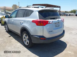 2013 Toyota RAV4 XLE with VIN JTMRFREV1DD030959, listed as a IAAI auction lot 42662601 with 99,719 mi miles and . Bid and sale history available at DreamBid. Image 3.