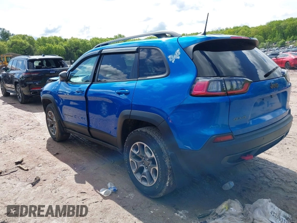 2020 Jeep Cherokee Trailhawk with VIN 1C4PJMBXXLD636547, listed as a IAAI auction lot 42314654 with 59,061 mi miles and . Bid and sale history available at DreamBid. Image 3.