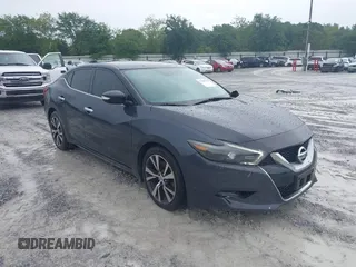 2016 Nissan Maxima Platinum z VIN 1N4AA6AP9GC408480, wystawiony jako IAAI lot #42383732 z przebiegiem 145 412 mil mil oraz . Historia ofert i sprzedaży dostępna na DreamBid. Obrazek 1.