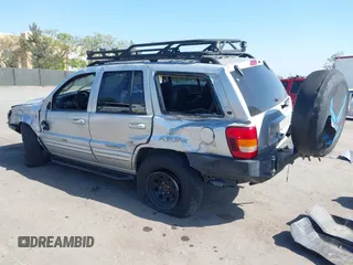 2004 Jeep Grand Cherokee Limited with VIN 1J8GW58N44C390592, listed as a IAAI auction lot 42150161 with Not provided miles and . Bid and sale history available at DreamBid. Image 3.