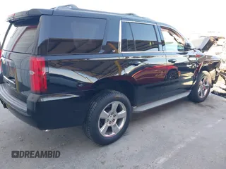 2015 Chevrolet Tahoe LT with VIN 1GNSCBKC6FR188764, listed as a IAAI auction lot 40267671 with 86,663 mi miles and . Bid and sale history available at DreamBid. Image 4.