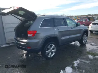2013 Jeep Grand Cherokee Overland with VIN 1C4RJFCG8DC581719, listed as a IAAI auction lot 41566666 with 152,332 mi miles. Bid and sale history available at carsss.com. Image 4.
