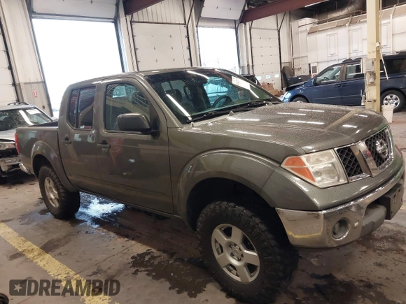2005 Nissan Frontier 4WD LE with VIN 1N6AD07W95C411421, listed as a IAAI auction lot 41847242 with 209,816 mi miles. Bid and sale history available at carsss.com. Image 13.