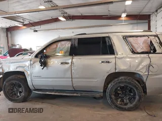 2016 Chevrolet Tahoe LTZ with VIN 1GNSKCKCXGR477284, listed as a IAAI auction lot 42221589 with Not provided miles and . Bid and sale history available at DreamBid. Image 14.