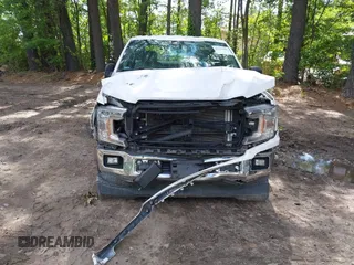2020 Ford F-150 XL z VIN 1FTMF1CB8LKF35069, wystawiony jako IAAI lot #42332865 z przebiegiem 73 452 mil mil oraz . Historia ofert i sprzedaży dostępna na DreamBid. Obrazek 6.