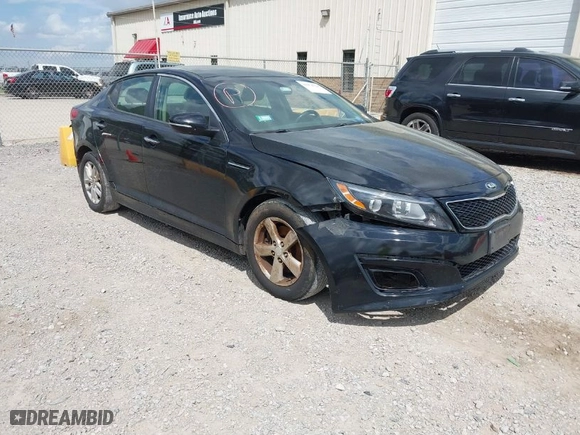 2015 Kia Optima LX with VIN 5XXGM4A77FG487033, listed as a IAAI auction lot 41974724 with 173,451 mi miles. Bid and sale history available at carsss.com. Image 1.