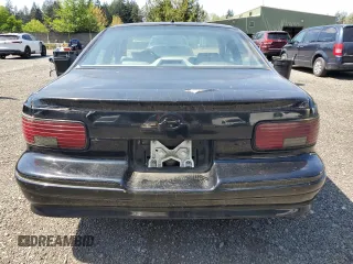 1996 Chevrolet Caprice 1SA Special Value with VIN 1G1BL52P7TR120054, listed as a Copart auction lot 55260005 with 213,627 mi miles and Clean Title. Bid and sale history available at DreamBid. Image 6.