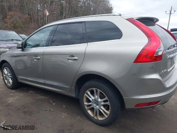 2015 Volvo XC60 T5 with VIN YV4612RKXF2739975, listed as a IAAI auction lot 41702442 with 116,649 mi miles. Bid and sale history available at carsss.com. Image 14.