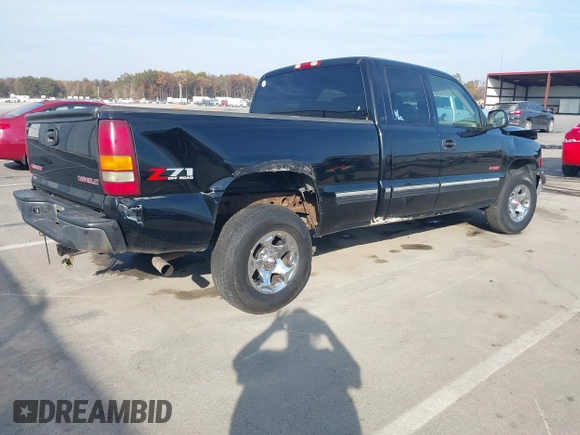 2002 Chevrolet Silverado 1500 LT with VIN 1GCEK19T52E262279, listed as a IAAI auction lot 40711298 with 251,098 mi miles. Bid and sale history available at carsss.com. Image 4.