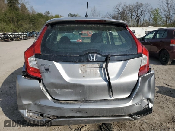 2019 Honda Fit LX z VIN 3HGGK5H41KM712693, wystawiony jako Copart lot #52069275 z przebiegiem 68 522 mil mil oraz Szkoda całkowita • Salvage title. Historia ofert i sprzedaży dostępna na DreamBid. Obrazek 6.