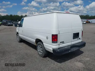 2011 Ford Econoline Cargo Commercial with VIN 1FTNE1EW4BDA34187, listed as a IAAI auction lot 42164691 with 210,699 mi miles. Bid and sale history available at carsss.com. Image 3.