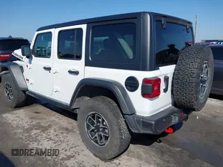 2024 Jeep Wrangler Rubicon with VIN 1C4PJXFG6RW291185, listed as a IAAI auction lot 41773050 with 12,400 mi miles and . Bid and sale history available at DreamBid. Image 3.
