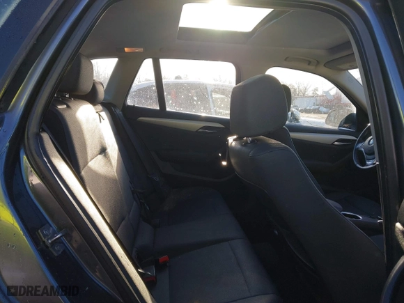 2014 BMW X1 sDrive28i with VIN WBAVM1C52EVW55890, listed as a IAAI auction lot 41512784 with 97,718 mi miles. Bid and sale history available at carsss.com. Image 8.