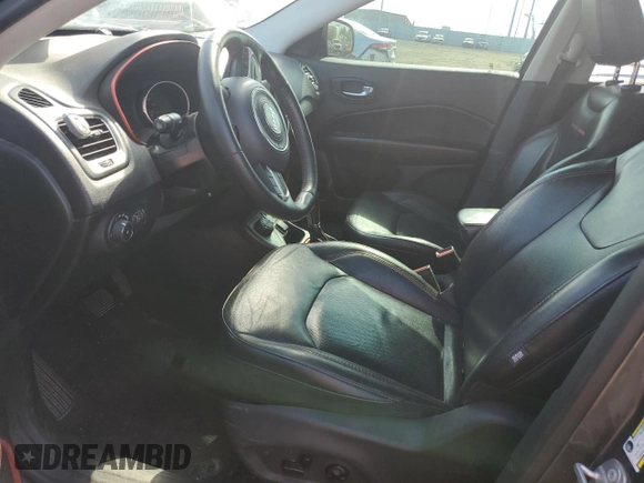 2018 Jeep Compass Trailhawk with VIN 3C4NJDDB0JT458339, listed as a Copart auction lot 58834155 with 103,811 mi miles and Salvage title. Bid and sale history available at DreamBid. Image 7.