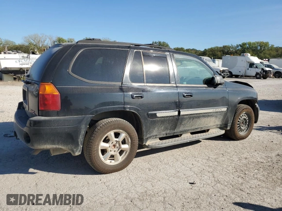2002 GMC Envoy SLE with VIN 1GKDS13S022512481, listed as a Copart auction lot 74701454 with 0 mi miles and Salvage Title. Bid and sale history available at carsss.com. Image 3.
