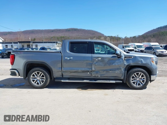 2021 GMC Sierra 1500 SLT z VIN 3GTU9DED7MG224460, wystawiony jako IAAI lot #41848912 z przebiegiem 65 319 mil mil oraz . Historia ofert i sprzedaży dostępna na DreamBid. Obrazek 13.