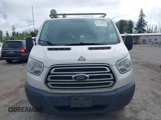 2015 Ford Transit Cargo with VIN 1FTNR1ZM6FKA34609, listed as a IAAI auction lot 42635875 with 214,750 mi miles and . Bid and sale history available at DreamBid. Image 12.