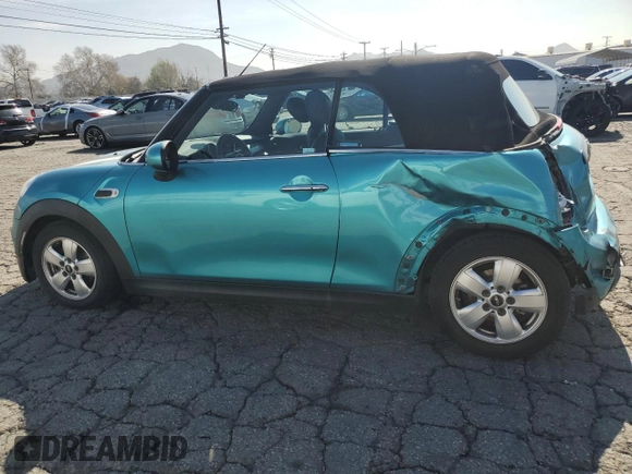 2019 MINI Convertible Cooper z VIN WMWWG5C50K3F79700, wystawiony jako Copart lot #45647955 z przebiegiem 65 168 mil mil oraz Szkoda całkowita • Salvage title. Historia ofert i sprzedaży dostępna na DreamBid. Obrazek 2.