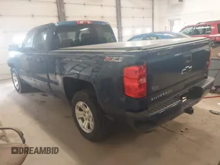 2017 Chevrolet Silverado 1500 LT with VIN 1GCVKREC1HZ136247, listed as a IAAI auction lot 42081569 with 123,906 mi miles and . Bid and sale history available at DreamBid. Image 3.