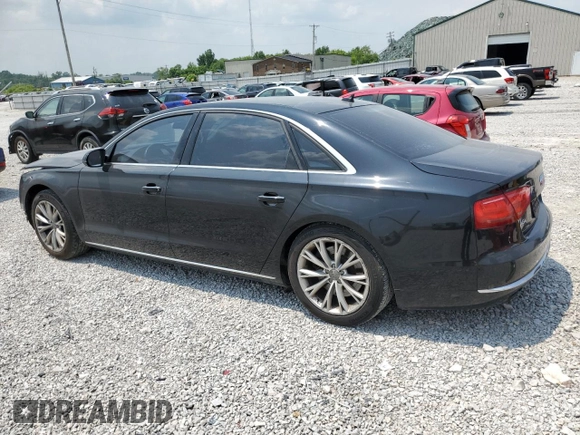 2012 Audi A8 with VIN WAURVAFDXCN026781, listed as a Copart auction lot 59197615 with 160,567 mi miles and Salvage title. Bid and sale history available at DreamBid. Image 2.