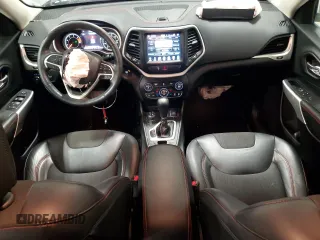 2018 Jeep Cherokee Trailhawk with VIN 1C4PJMBB8JD599791, listed as a Copart auction lot 86650054 with 66,360 mi miles and Non Repairable. Bid and sale history available at DreamBid. Image 8.