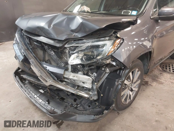 2019 Honda Pilot EX-L with VIN 5FNYF6H57KB062293, listed as a IAAI auction lot 41936964 with 93,012 mi miles and . Bid and sale history available at DreamBid. Image 6.