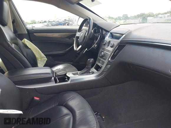 2012 Cadillac CTS with VIN 1G6DC5E52C0116219, listed as a IAAI auction lot 42463440 with 190,818 mi miles and . Bid and sale history available at DreamBid. Image 5.