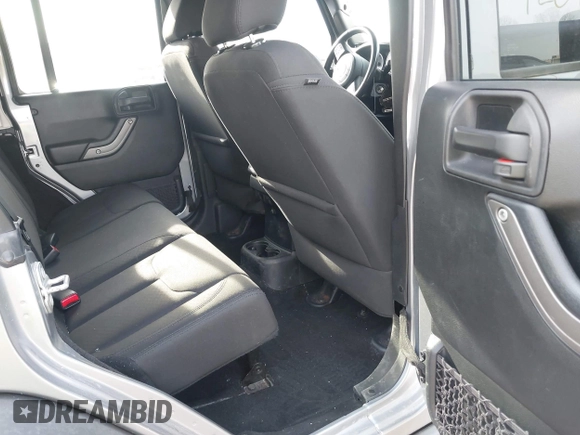 2016 Jeep Wrangler Unlimited Sport z VIN 1C4HJWDGXGL328531, wystawiony jako IAAI lot #42056907 z przebiegiem 75 871 mil mil oraz . Historia ofert i sprzedaży dostępna na DreamBid. Obrazek 8.