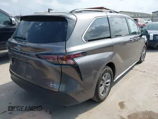 2023 Toyota Sienna XLE with VIN 5TDYRKEC4PS163555, listed as a IAAI auction lot 42102074 with 56,906 mi miles. Bid and sale history available at carsss.com. Image 4.