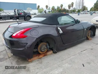 2010 Nissan 370Z Touring with VIN JN1AZ4FH3AM301311, listed as a IAAI auction lot 41976379 with 51,347 mi miles. Bid and sale history available at carsss.com. Image 4.