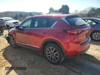 2018 Mazda CX-5 Grand Touring with VIN JM3KFADM5J0350937, listed as a Copart auction lot 46525965 with 59,478 mi miles and Salvage Title. Bid and sale history available at DreamBid. Image 2.