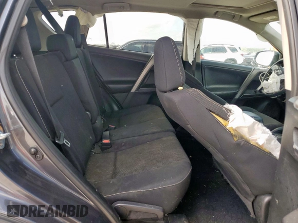 2018 Toyota RAV4 XLE with VIN 2T3WFREV2JW409292, listed as a Copart auction lot 61577355 with 189,258 mi miles and Salvage title. Bid and sale history available at DreamBid. Image 11.