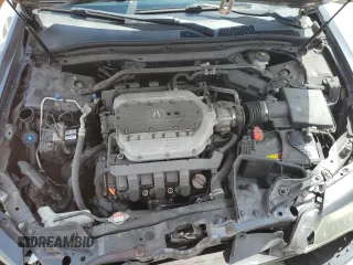 2013 Acura TL Technology z VIN 19UUA8F54DA008734, wystawiony jako Copart lot #54129665 z przebiegiem 109 898 mil mil oraz Szkoda całkowita • Salvage title. Historia ofert i sprzedaży dostępna na DreamBid. Obrazek 11.