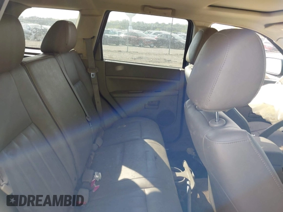 2005 Jeep Grand Cherokee Laredo z VIN 1J4GR48KX5C593240, wystawiony jako IAAI lot #40390746 z przebiegiem 177 646 mil mil oraz . Historia ofert i sprzedaży dostępna na DreamBid. Obrazek 8.