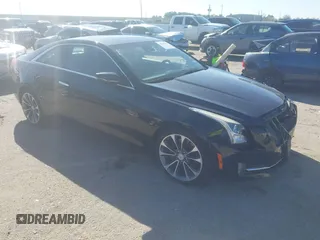 2015 Cadillac ATS Luxury RWD z VIN 1G6AB1RX6F0116223, wystawiony jako IAAI lot #41759134 z przebiegiem 100 026 mil mil oraz . Historia ofert i sprzedaży dostępna na DreamBid. Obrazek 1.