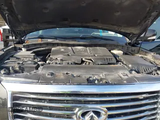 2012 Infiniti QX56 8-passenger with VIN JN8AZ2ND1C9715889, listed as a IAAI auction lot 41440893 with 221,212 mi miles and . Bid and sale history available at DreamBid. Image 18.