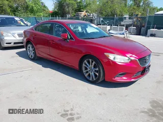 2014 Mazda Mazda6 i Touring with VIN JM1GJ1V66E1147617, listed as a IAAI auction lot 42154697 with 218,802 mi miles. Bid and sale history available at carsss.com. Image 1.