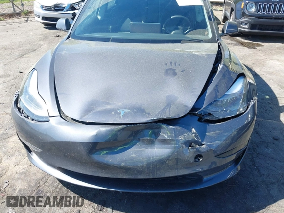 2023 Tesla Model 3 with VIN 5YJ3E1EA6PF645110, listed as a IAAI auction lot 42044357 with 24,352 mi miles and . Bid and sale history available at DreamBid. Image 6.