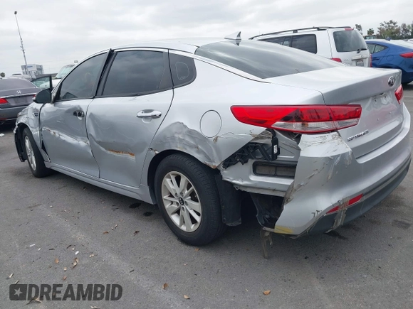 2016 Kia Optima LX with VIN 5XXGT4L34GG023812, listed as a IAAI auction lot 42034160 with 96,720 mi miles and . Bid and sale history available at DreamBid. Image 3.