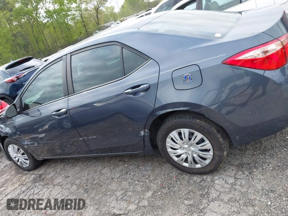 2019 Toyota Corolla L with VIN 5YFBURHE8KP936426, listed as a IAAI auction lot 42029018 with 190,163 mi miles and . Bid and sale history available at DreamBid. Image 14.
