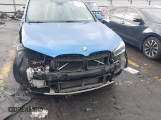 2016 BMW X1 xDrive28i with VIN WBXHT3C31G5E55119, listed as a IAAI auction lot 40894704 with 126,561 mi miles. Bid and sale history available at carsss.com. Image 6.