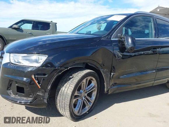 2017 Audi Q3 Premium Plus z VIN WA1HCCFS7HR001054, wystawiony jako IAAI lot #41583344 z przebiegiem 79 330 mil mil oraz . Historia ofert i sprzedaży dostępna na DreamBid. Obrazek 6.