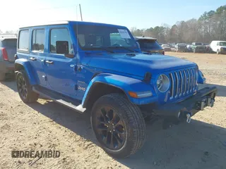 2022 Jeep Wrangler Unlimited Sahara z VIN 1C4JJXP64NW192452, wystawiony jako IAAI lot #41631295 z przebiegiem 23 738 mil mil oraz . Historia ofert i sprzedaży dostępna na DreamBid. Obrazek 1.