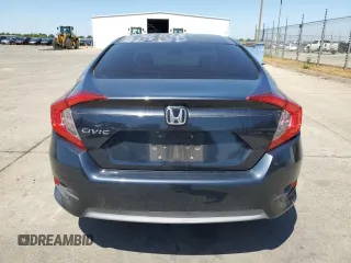 2017 Honda Civic LX z VIN 2HGFC2F55HH523474, wystawiony jako Copart lot #54933425 z przebiegiem 133 036 mil mil oraz Szkoda całkowita • Salvage title. Historia ofert i sprzedaży dostępna na DreamBid. Obrazek 6.