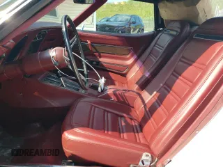 1974 Chevrolet Corvette with VIN 1Z67J4S405054, listed as a Copart auction lot 66356575 with 7,810 mi miles and Salvage title. Bid and sale history available at DreamBid. Image 7.